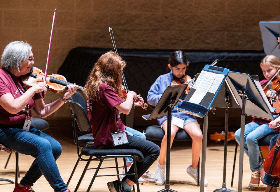 children playing violins
