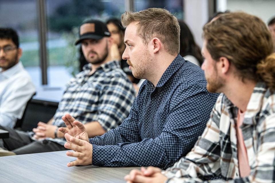 Students attending a discussion.