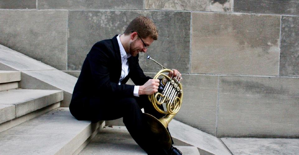 man with french horn