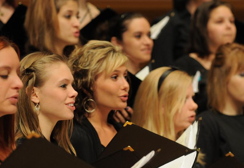 women singing in group