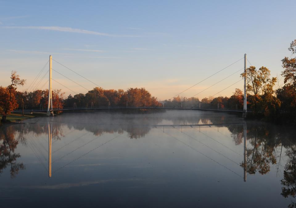 Ron Venderly Family Pedestrian bridge at sunrise.