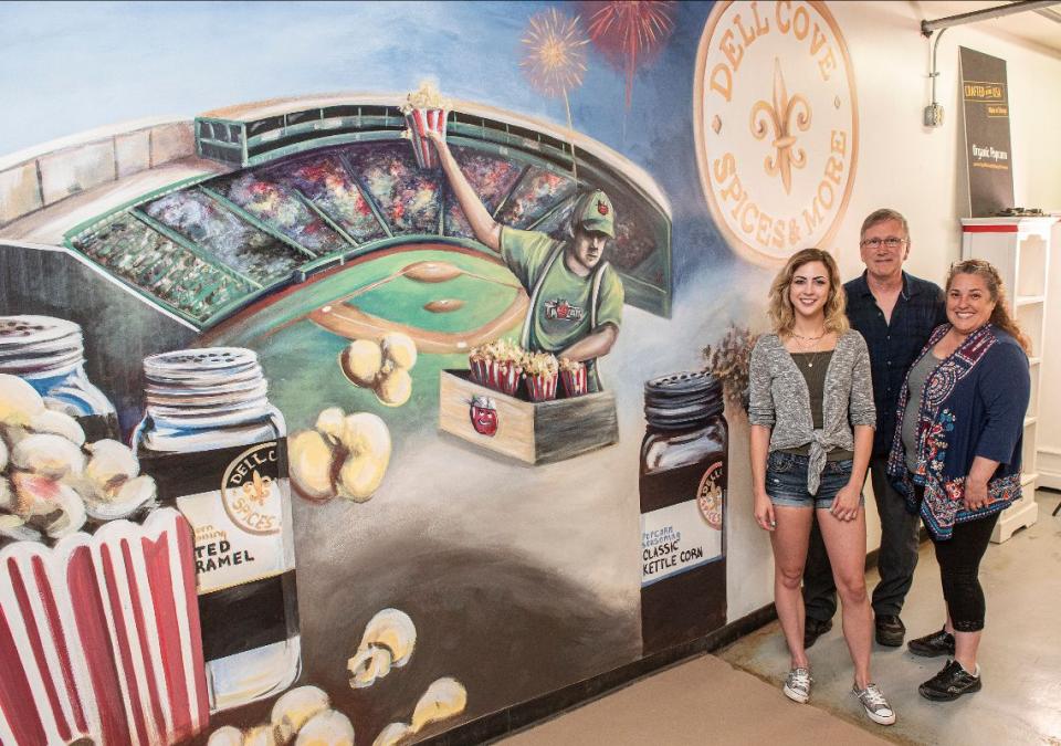 Sam Fulk, David and Patricia Beets admire the finished mural.
