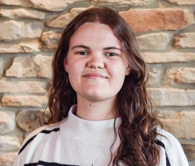 Portrait of Aria Baker.