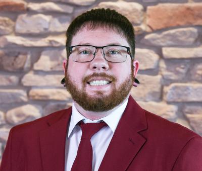 Portrait of Nikolas Travis.