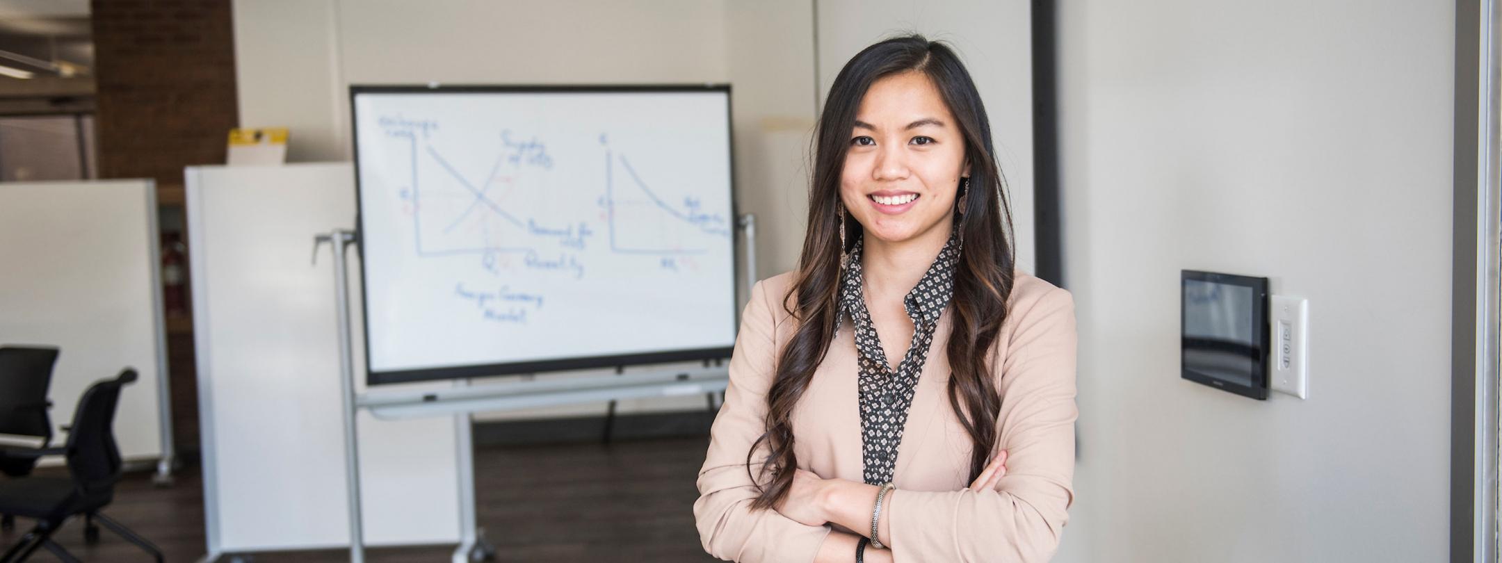 Female business student posing indoors.