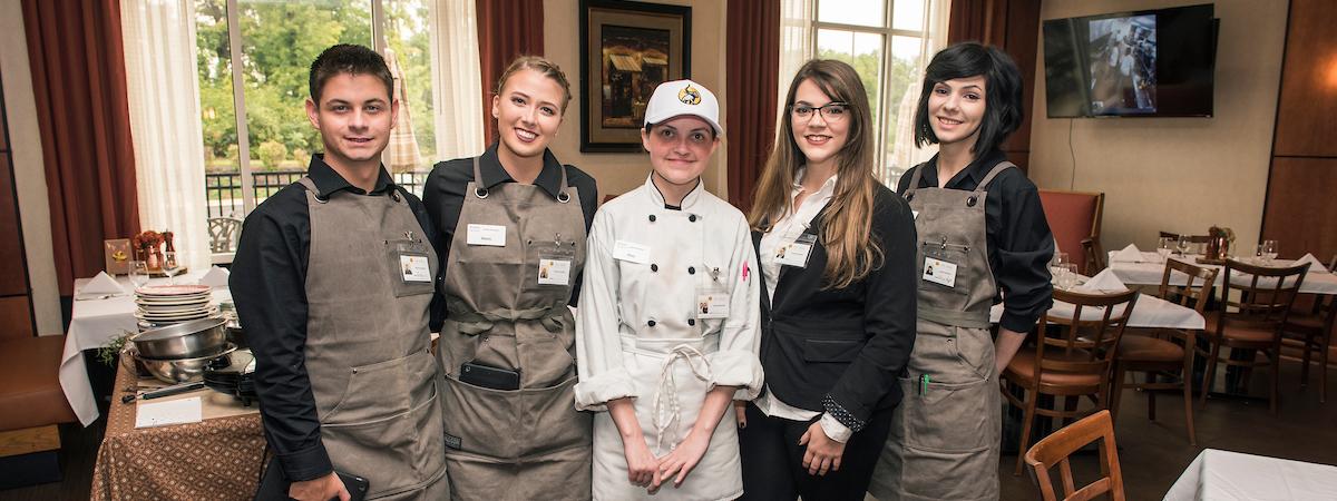 Students working at event