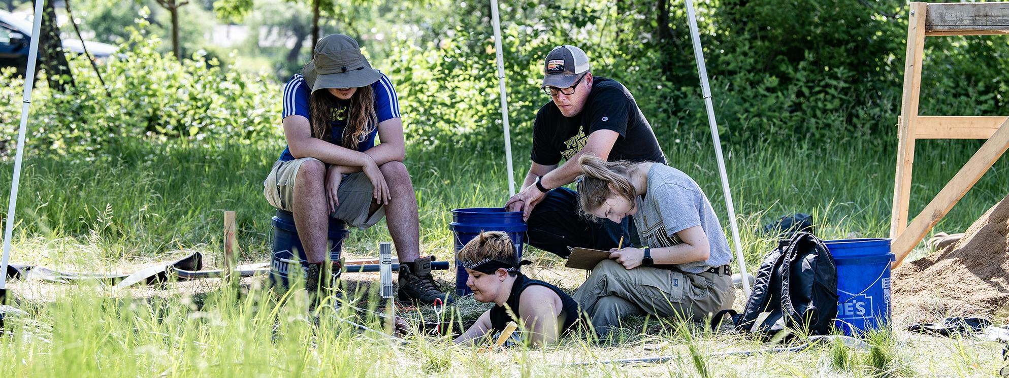 Anthropology students working in the field.