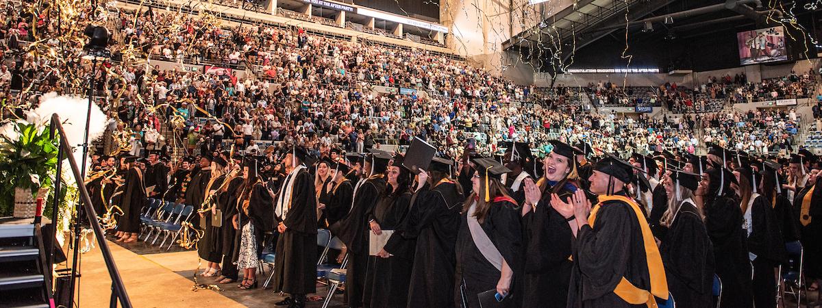 Students celebrating during the 2023 Commencement.