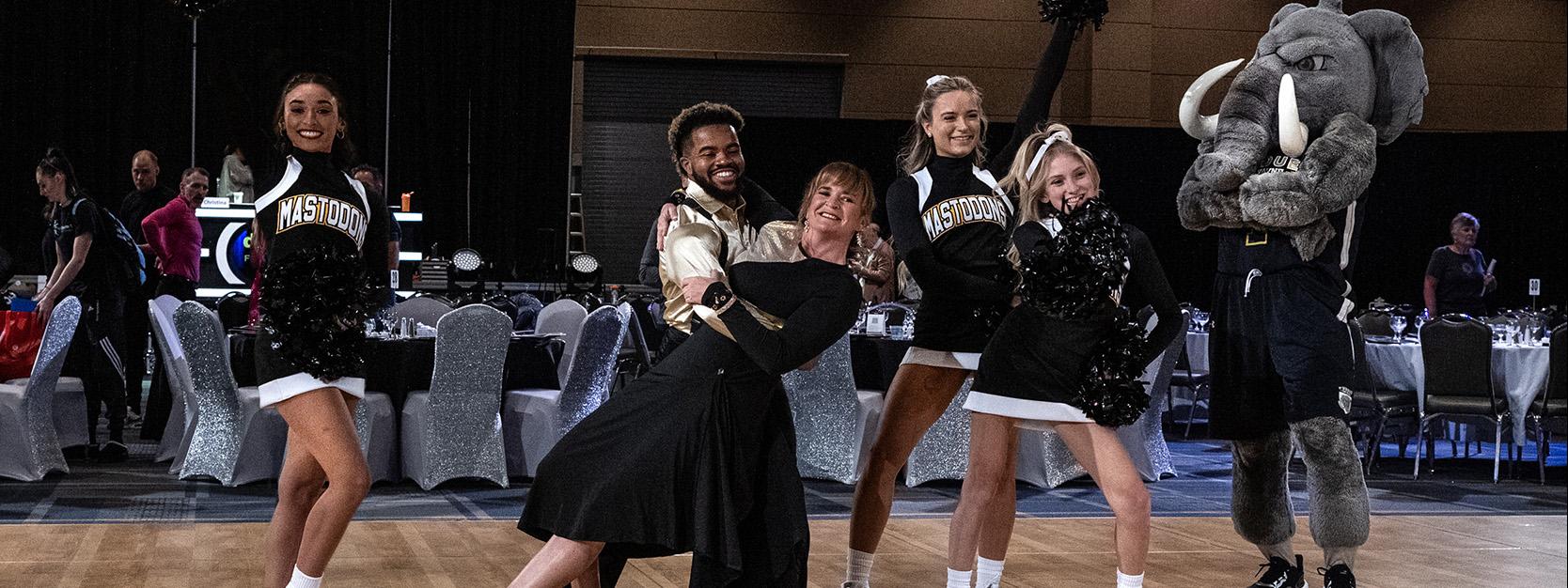 Kim Grannan, PFW cheerleaders, and Don the Mastodon