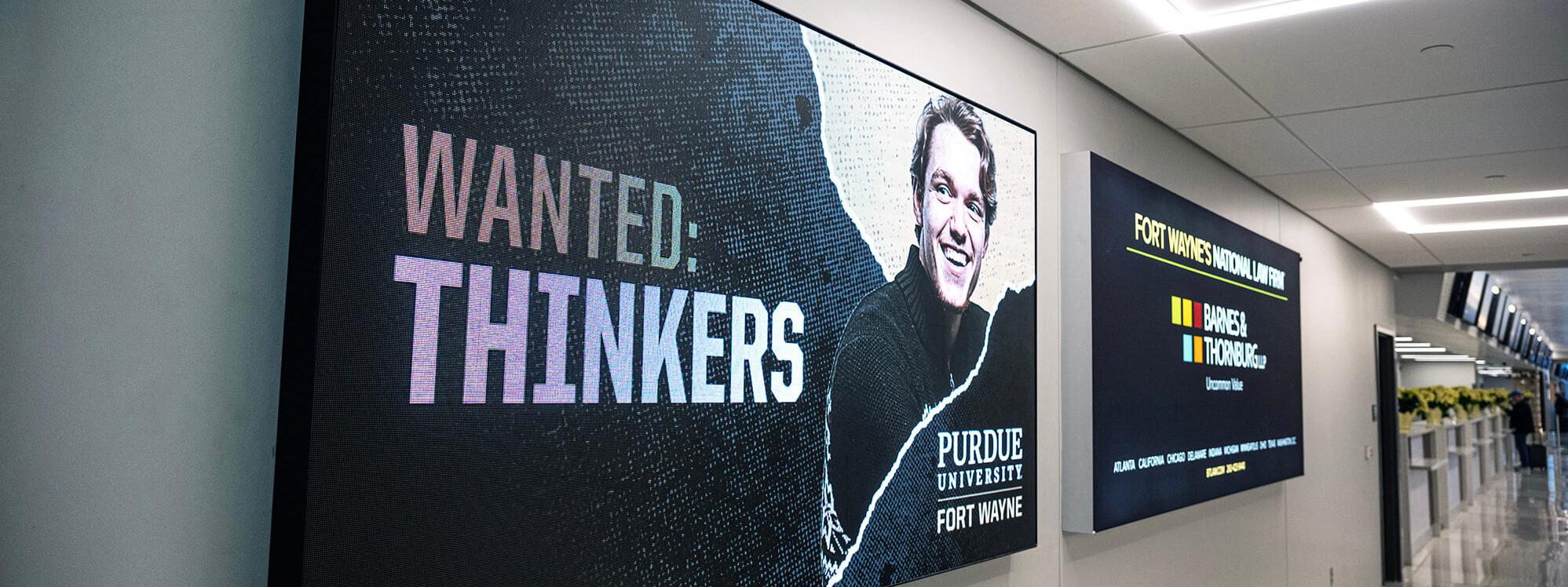 A Purdue Fort Wayne ad in the Fort Wayne International Airport.