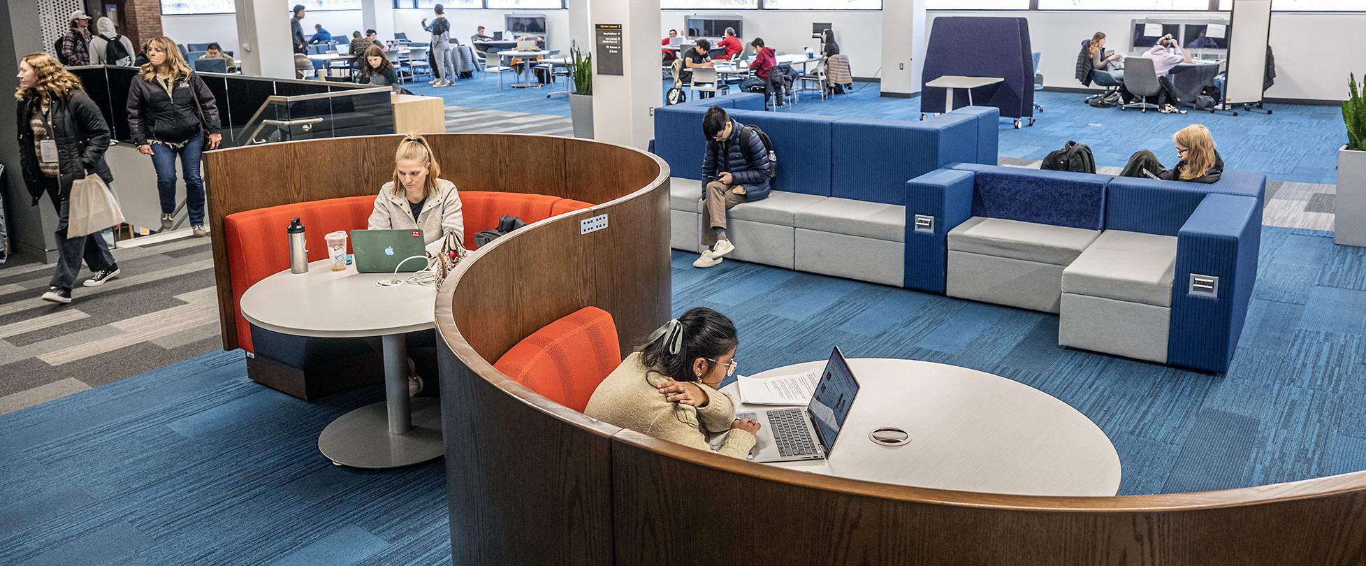 Students studying on the second floor of Helmke.