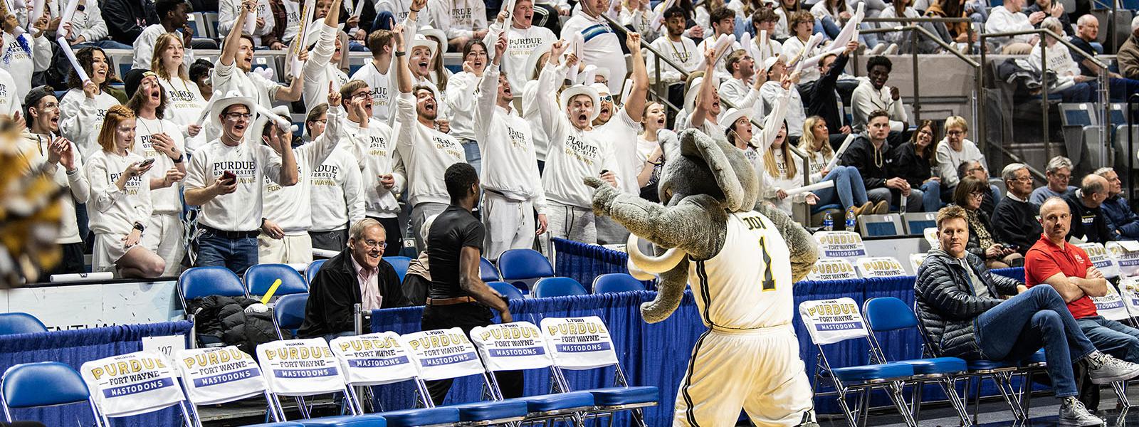 Don the Mastodon fires up the Herd at a homecoming game.