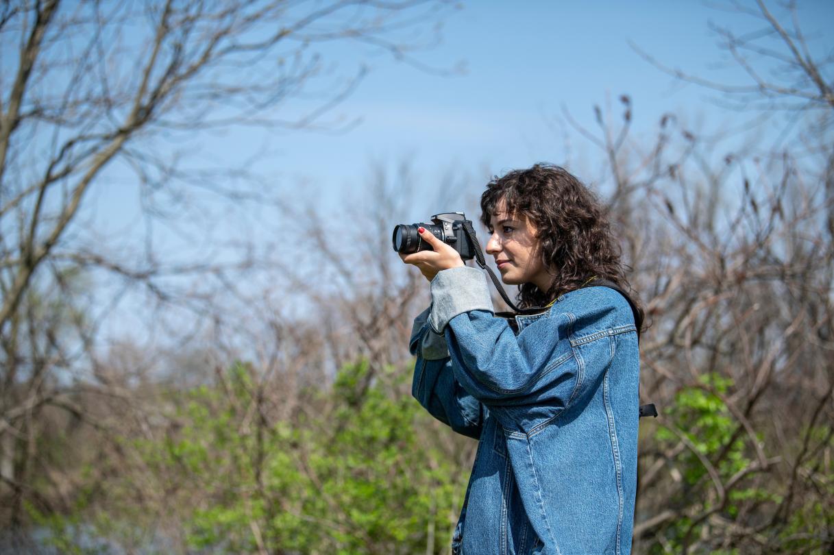 Student with a camera.