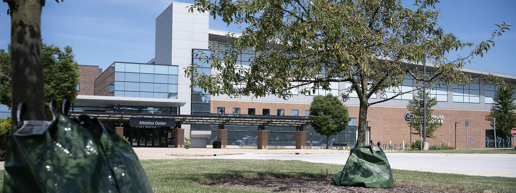 New trees planted outside of the Lutheran Health Fieldhouse