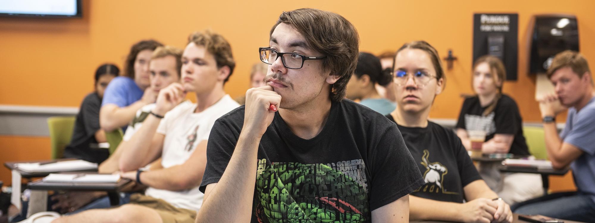 COLA students listen to a lecture.