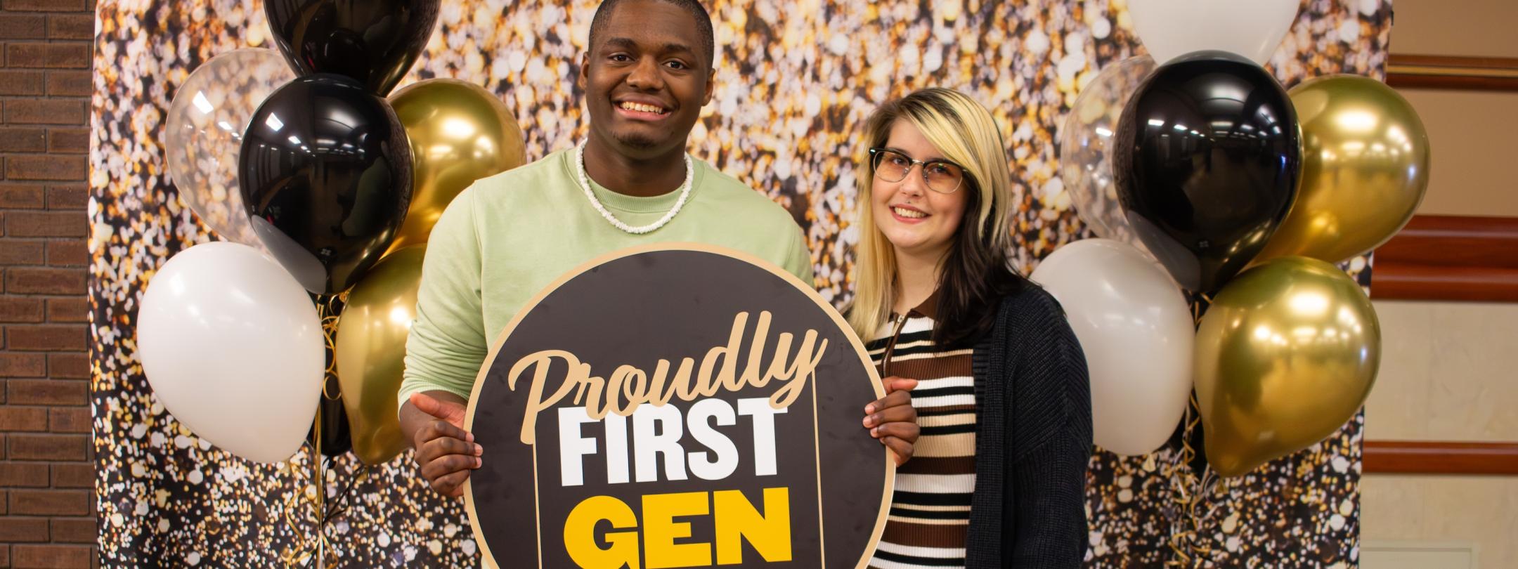 Students holding a First Gen sign.