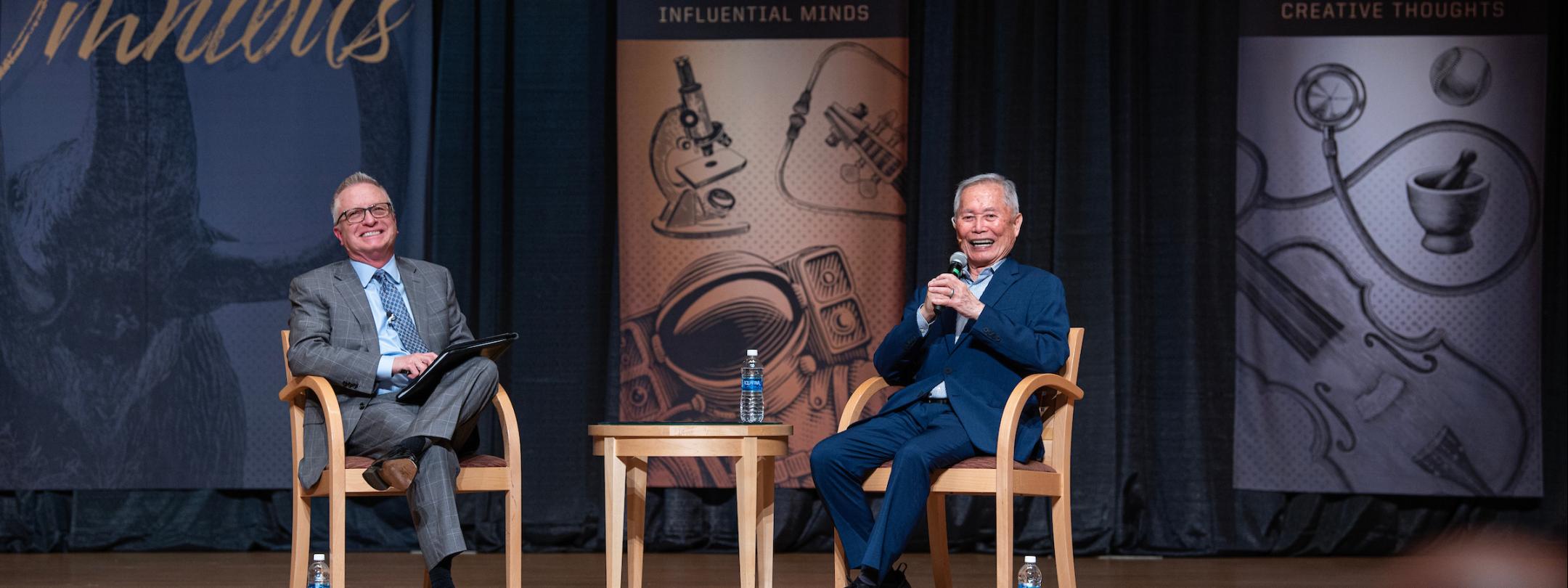 George Takei speaking onstage