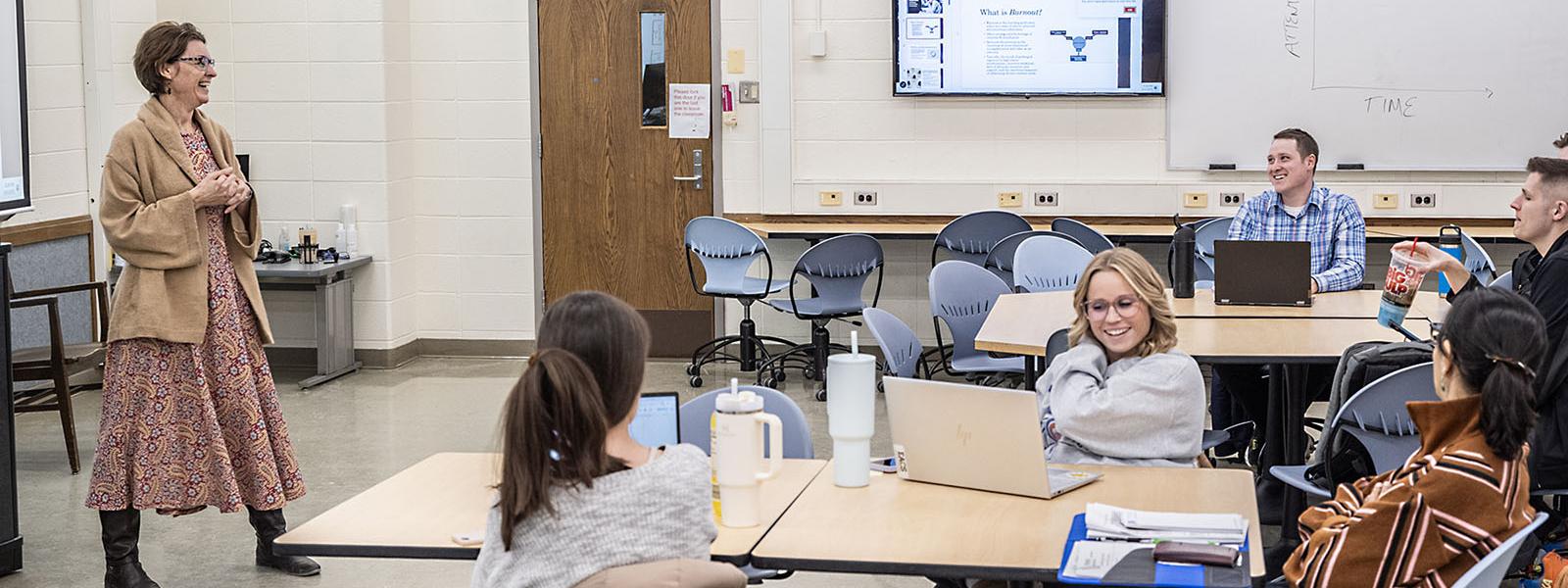 A group of teacher candidates in a classroom setting