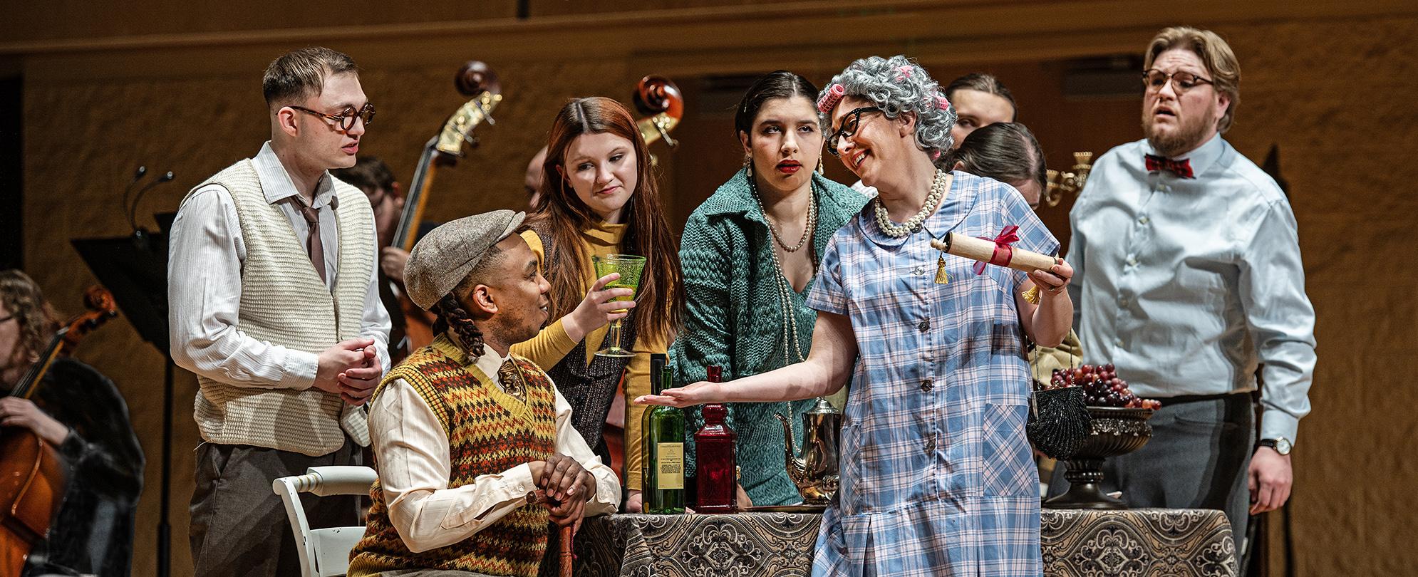 Theatre students onstage during a performance.