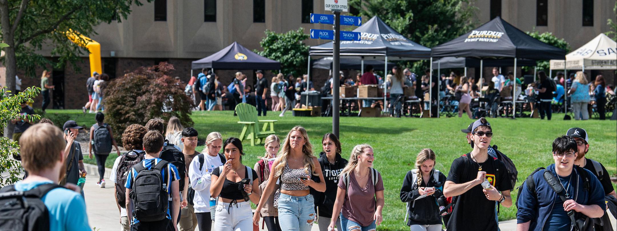 Students are walking down PFW's Mastodon Way