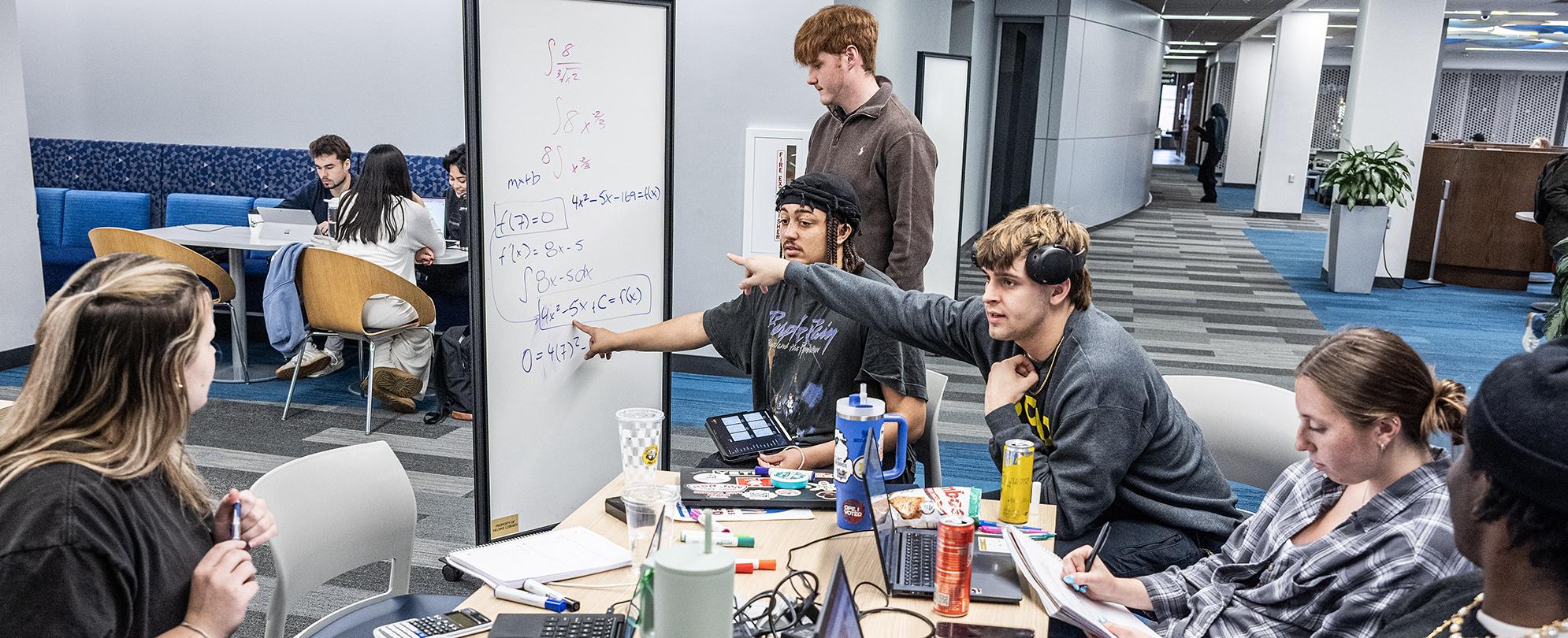 Students study together in Helmke Library.