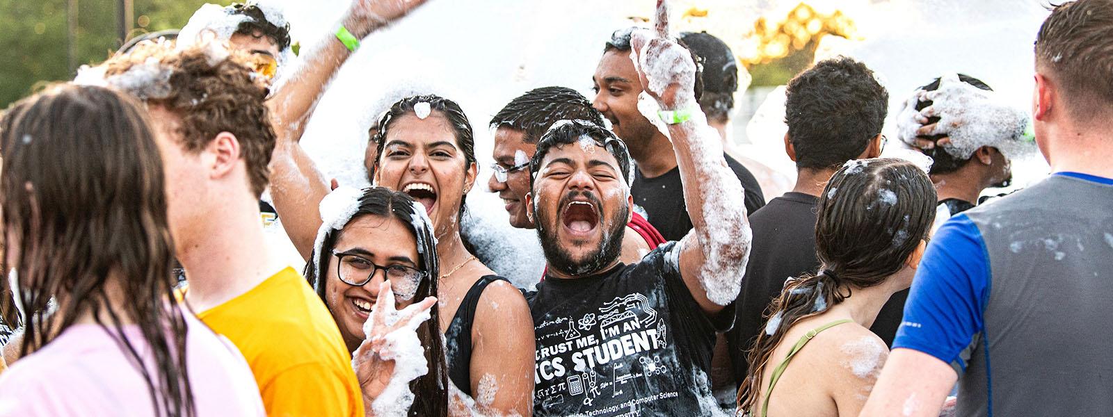 Students are having fun at a foam party