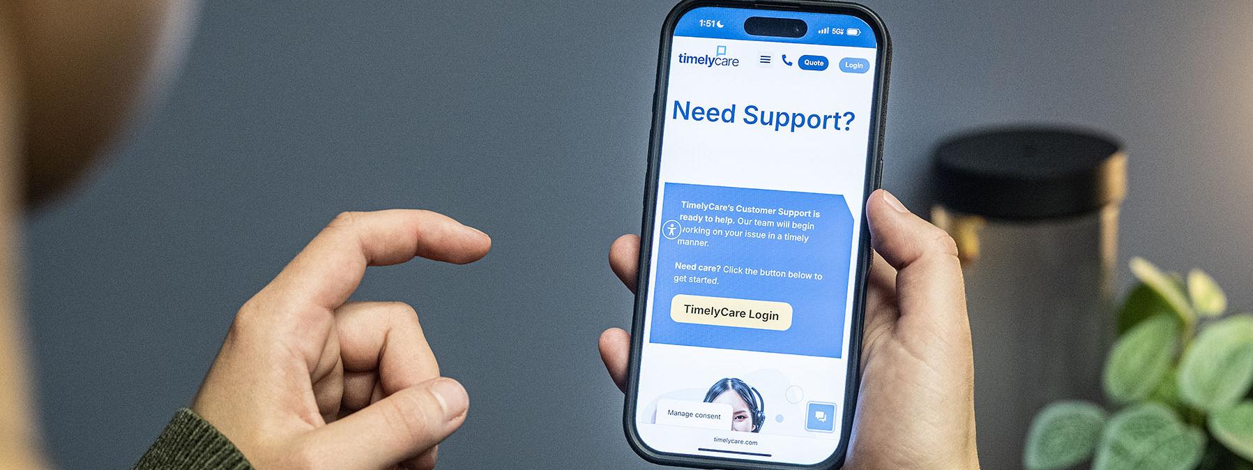 A student is using the TimelyCare app on their phone