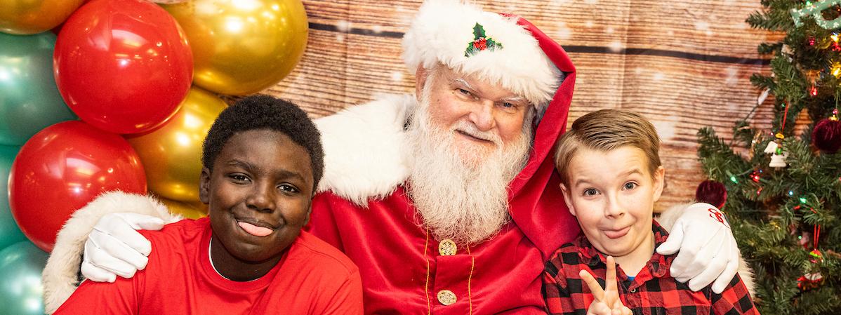 Kids posing with Santa