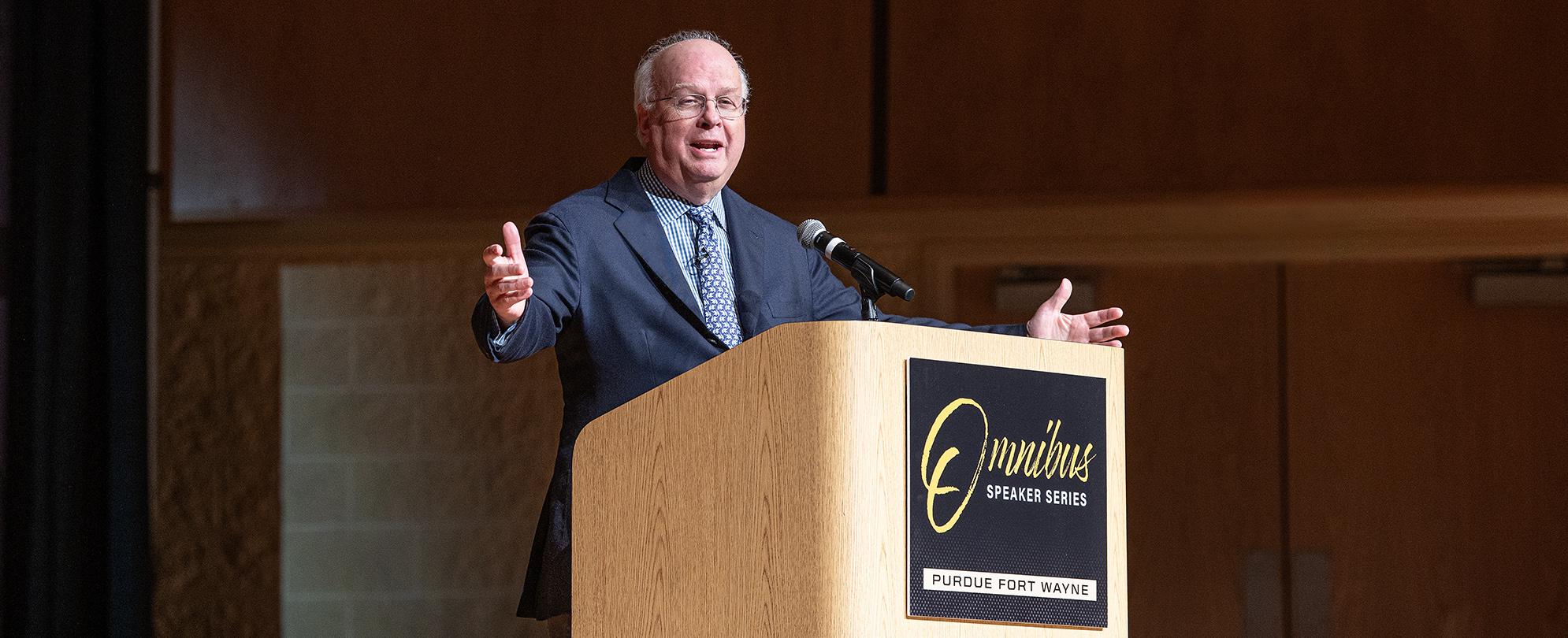 Karl Rove addresses the audience in Auer Hall during the Omnibus Speaker Series.