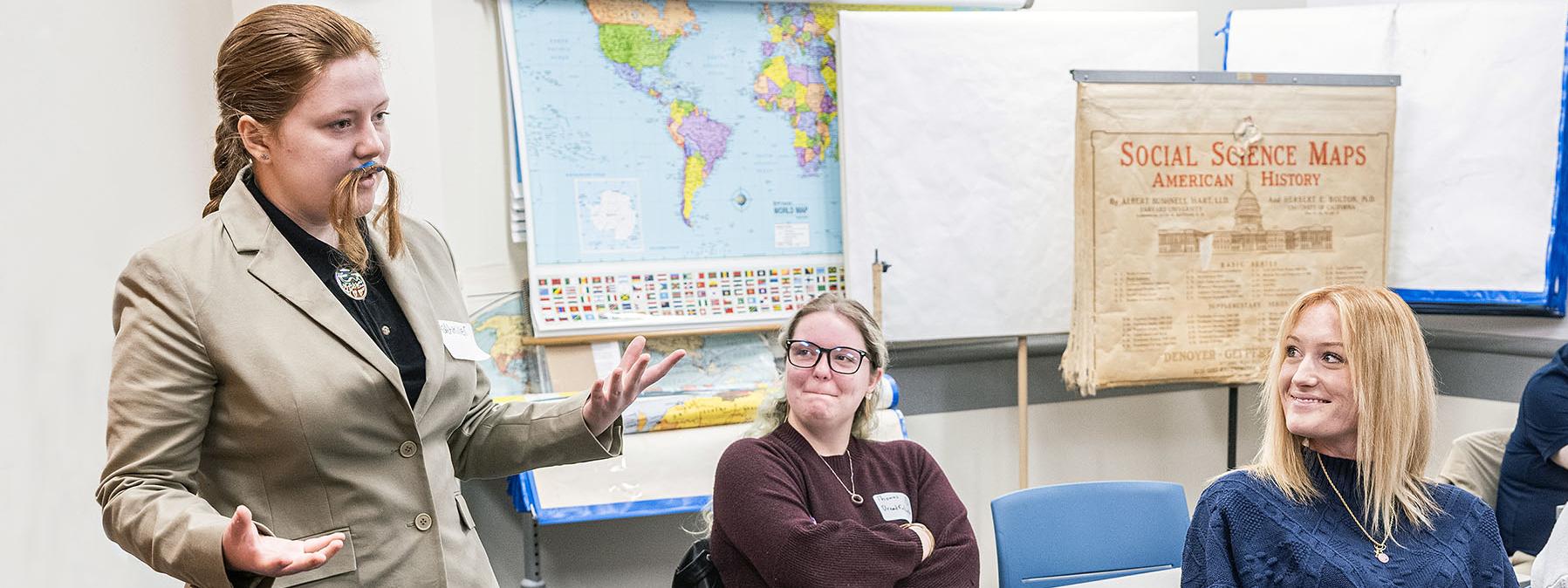 A student is giving a history class presentation