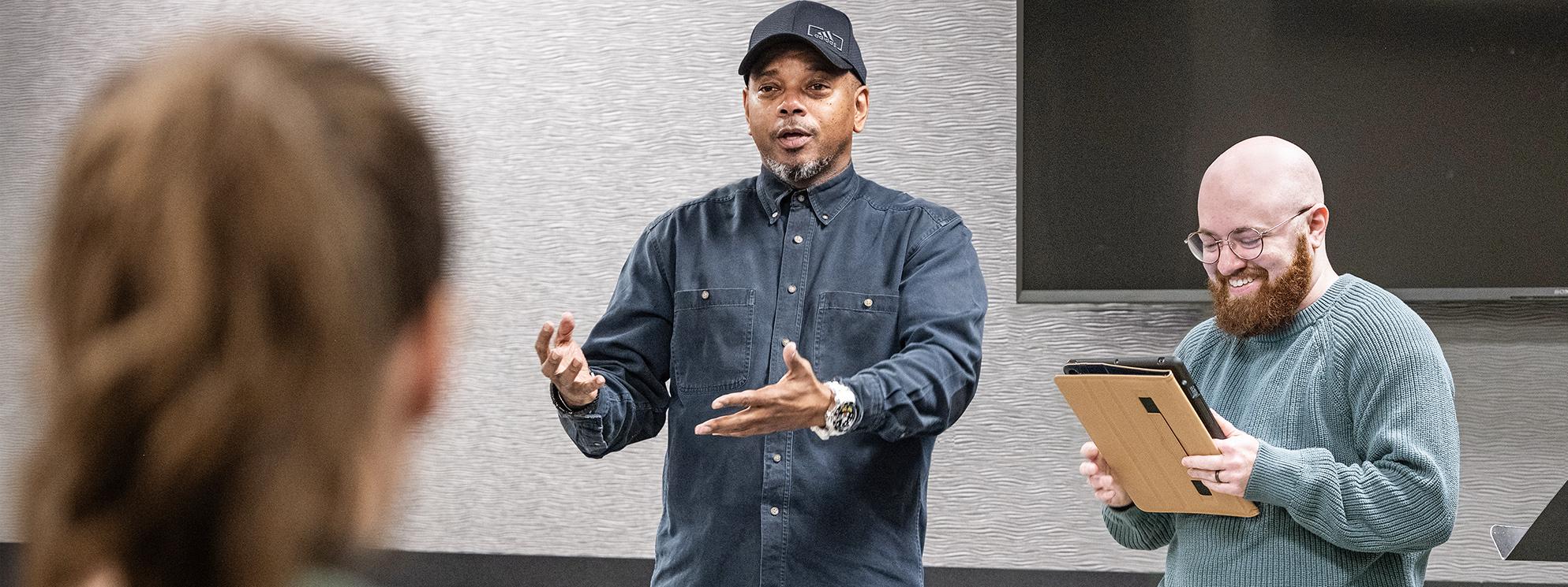 Two people giving a presentation