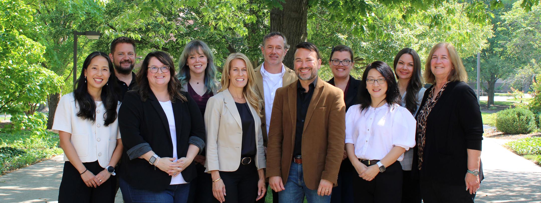 CELT staff standing outside