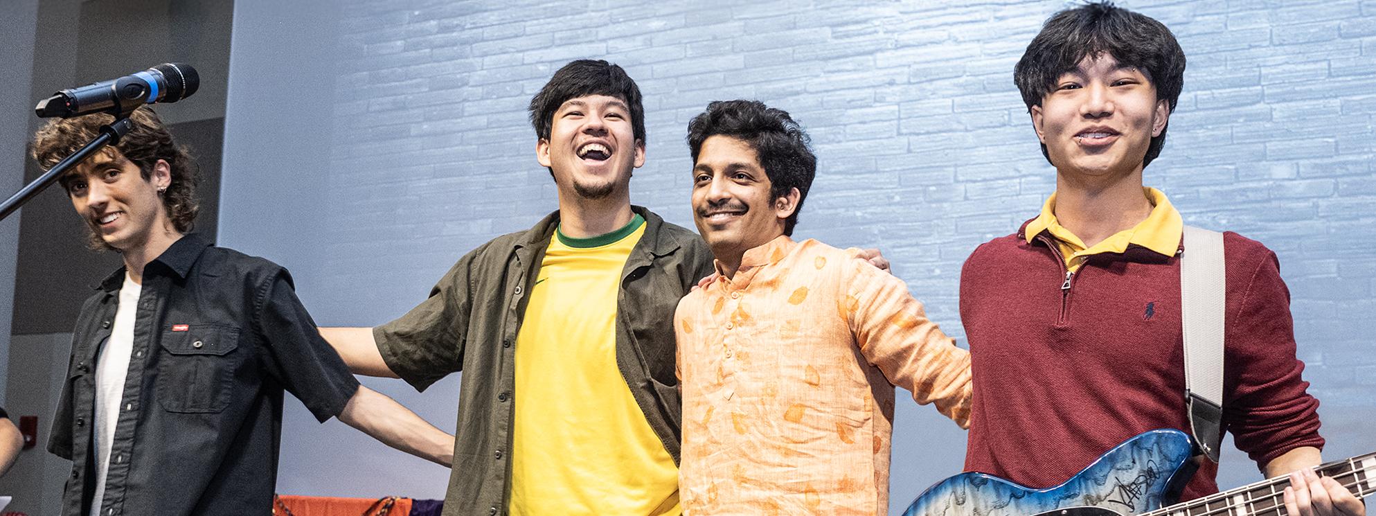 Students recording music in a studio