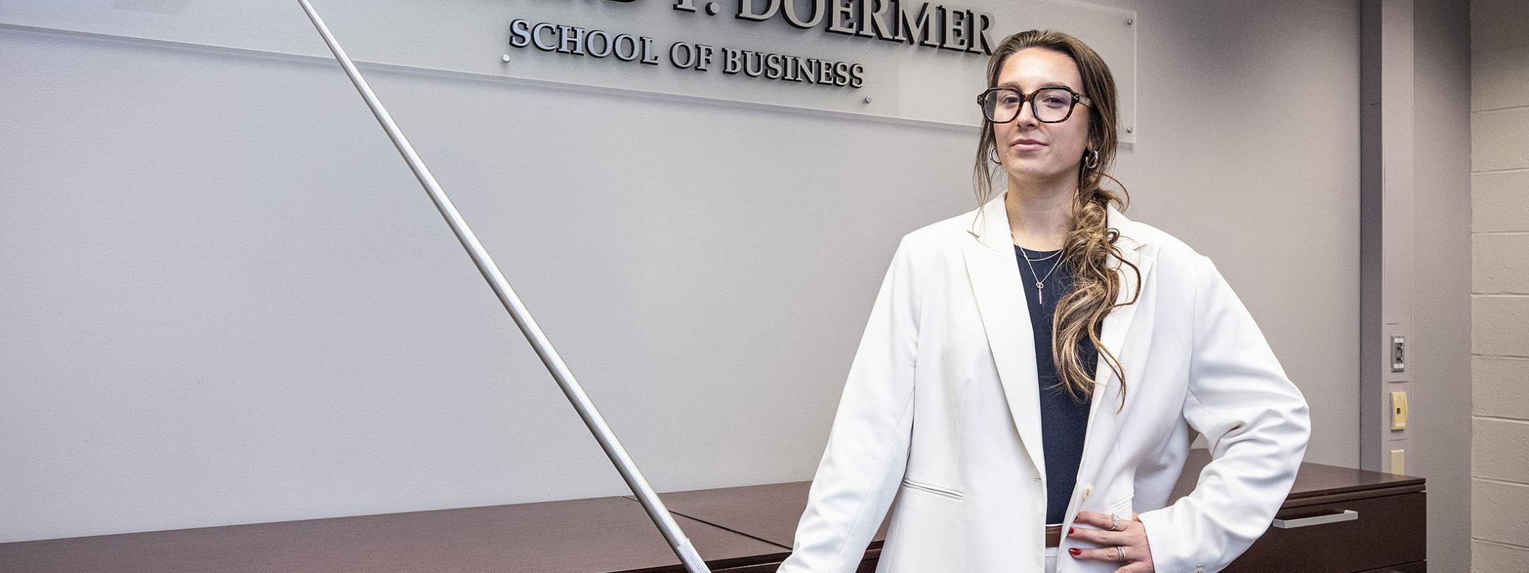 Emilia Russell is holding a javelin