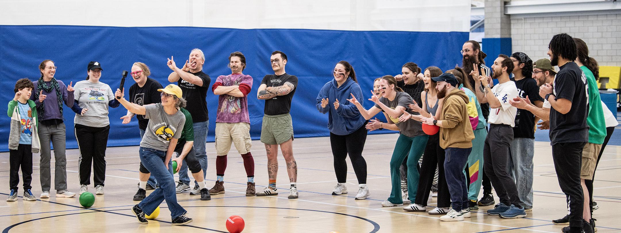 The Dean of Liberal Arts takes a video of all the dodgeball participants