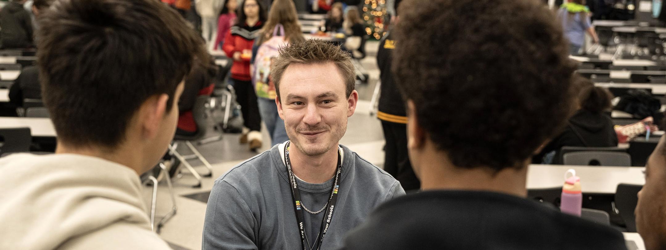 Trevor Helmkamp is speaking to high school students