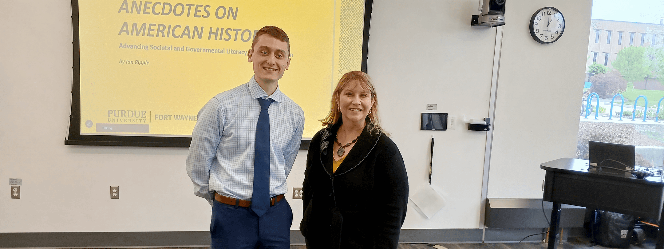 Ian ripple and Kim O'Connor in a classroom