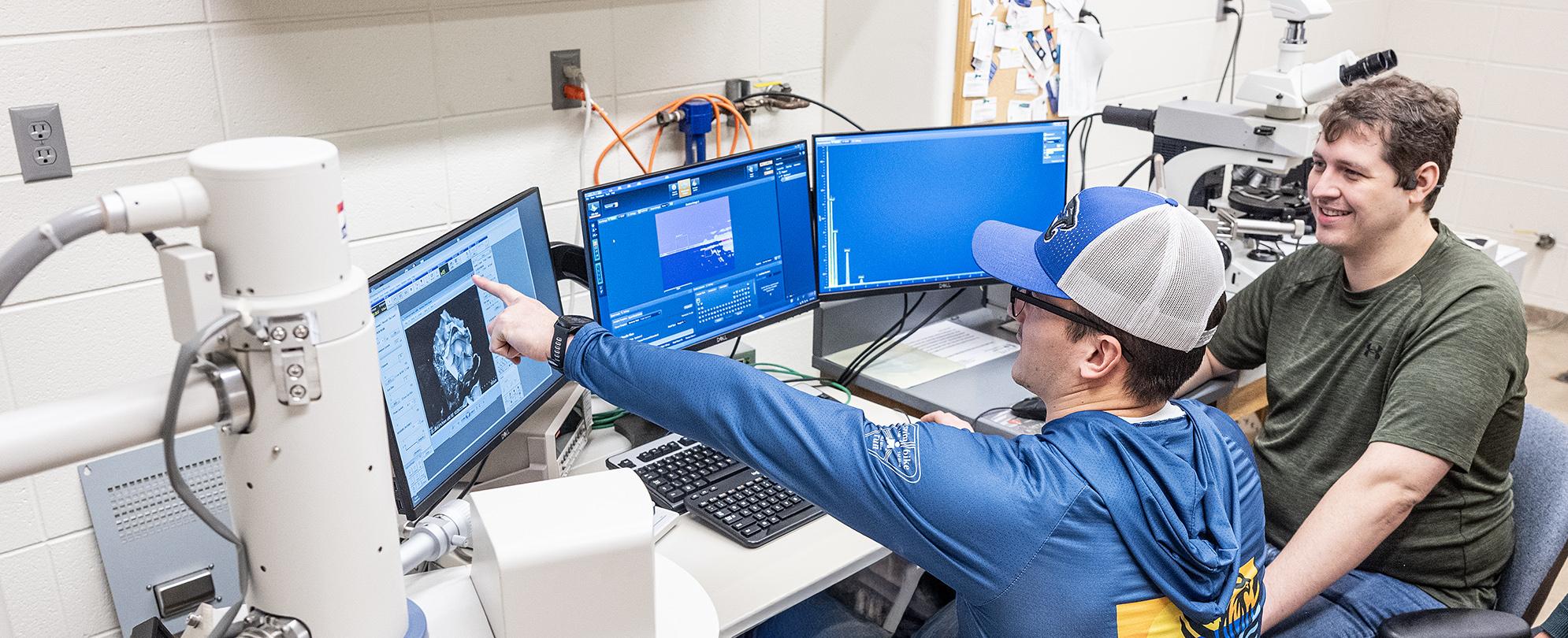 Two students in technology lab