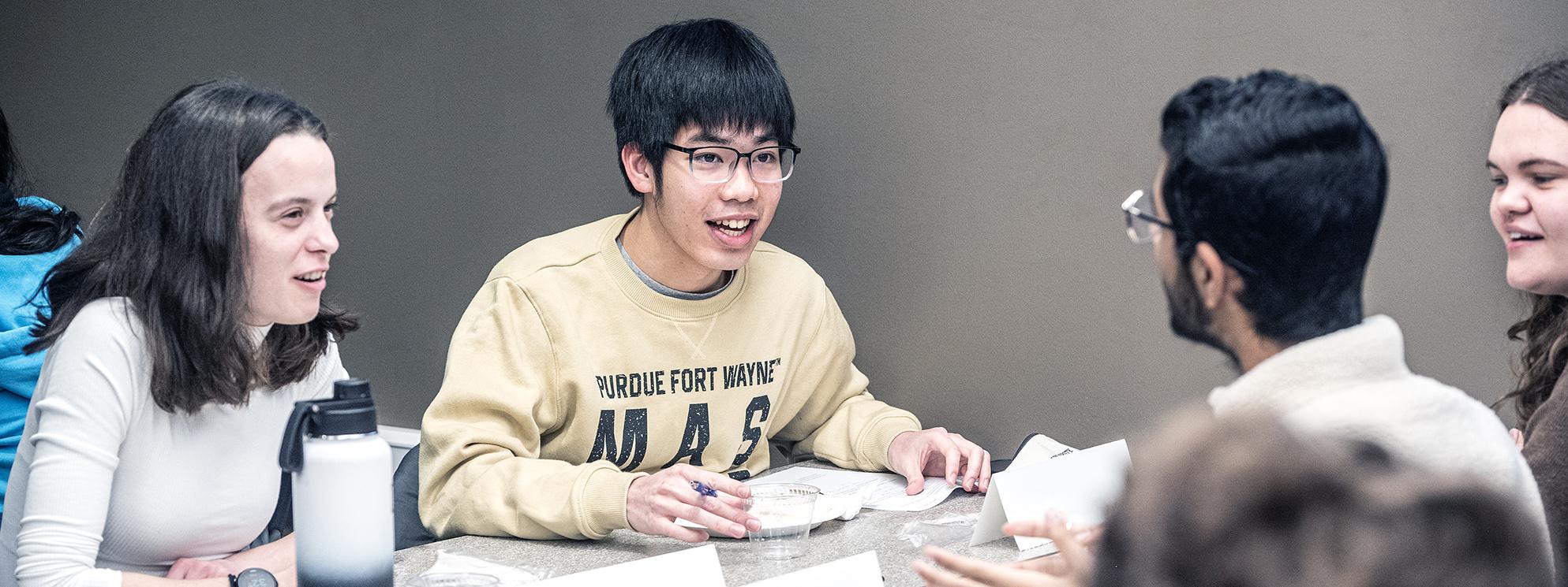 Students studying and discussing together