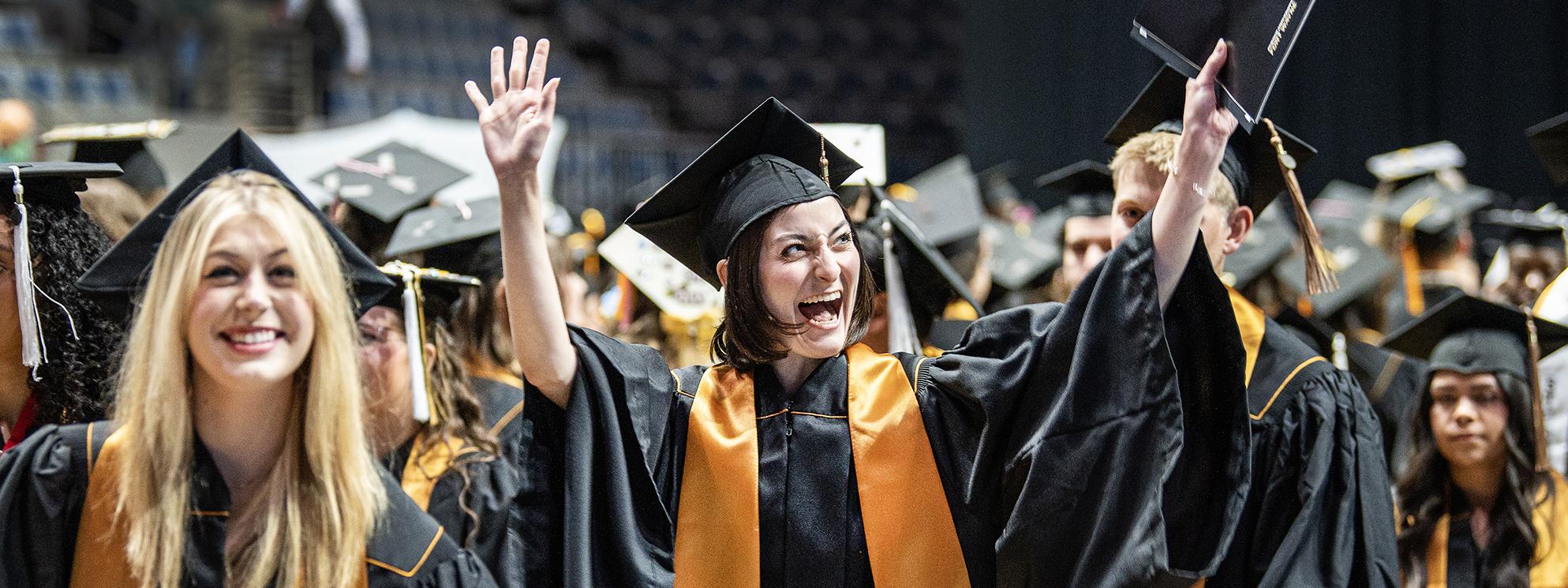 Students celebrate during the 2026 commencement ceremony