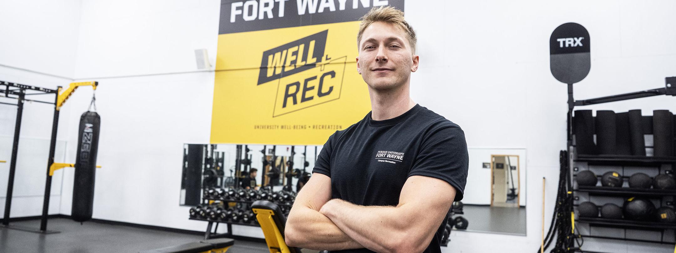 Sebastien Wilson is in a weight room at a gym