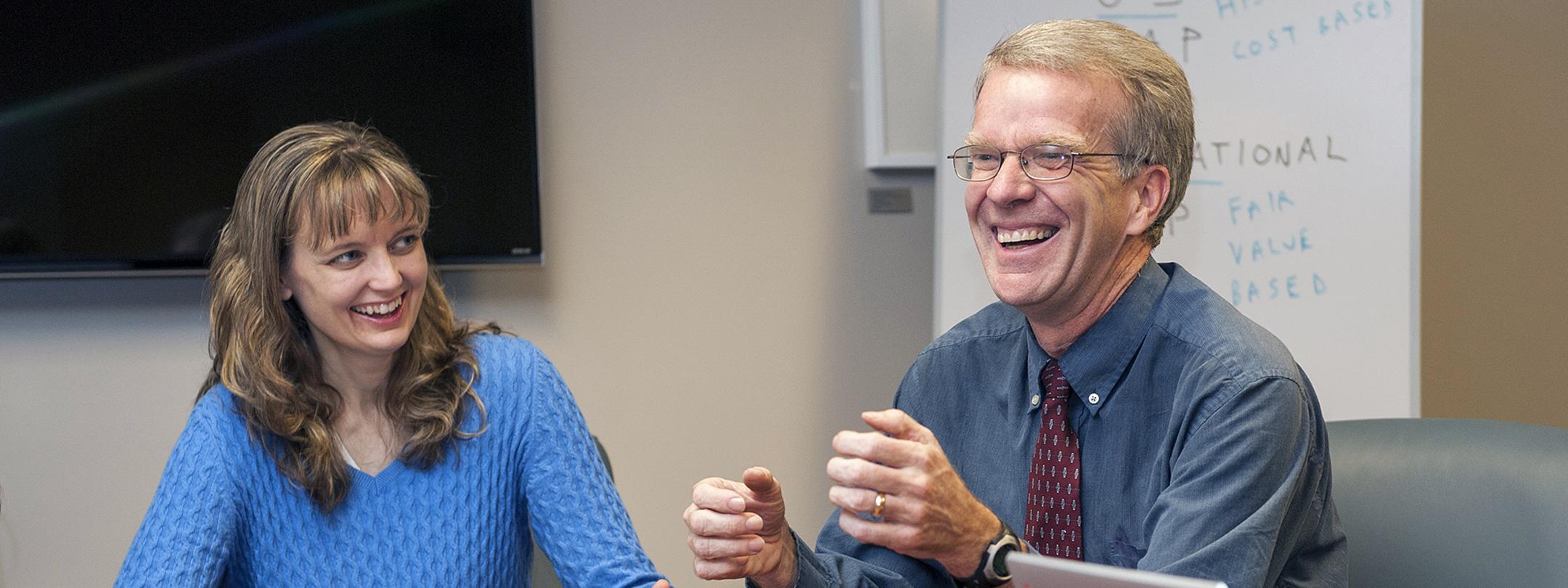 Michael Slaubaugh and student in an Accounting class