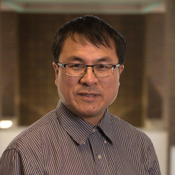 Guoping Wang