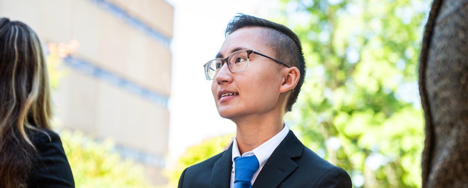 Student wearing a suit