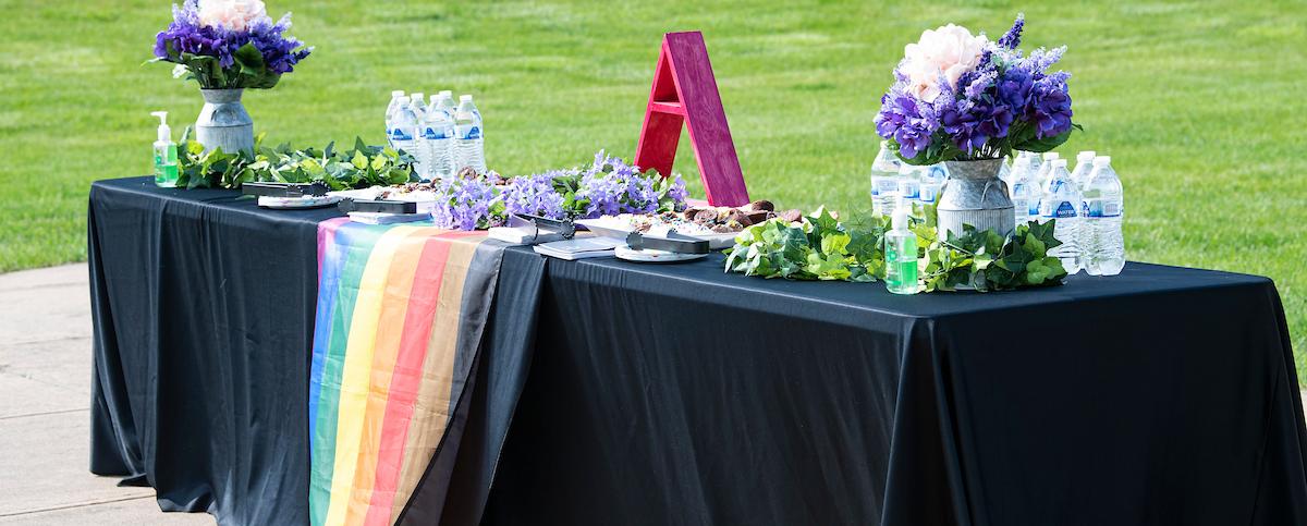 A table with a rainbow flag