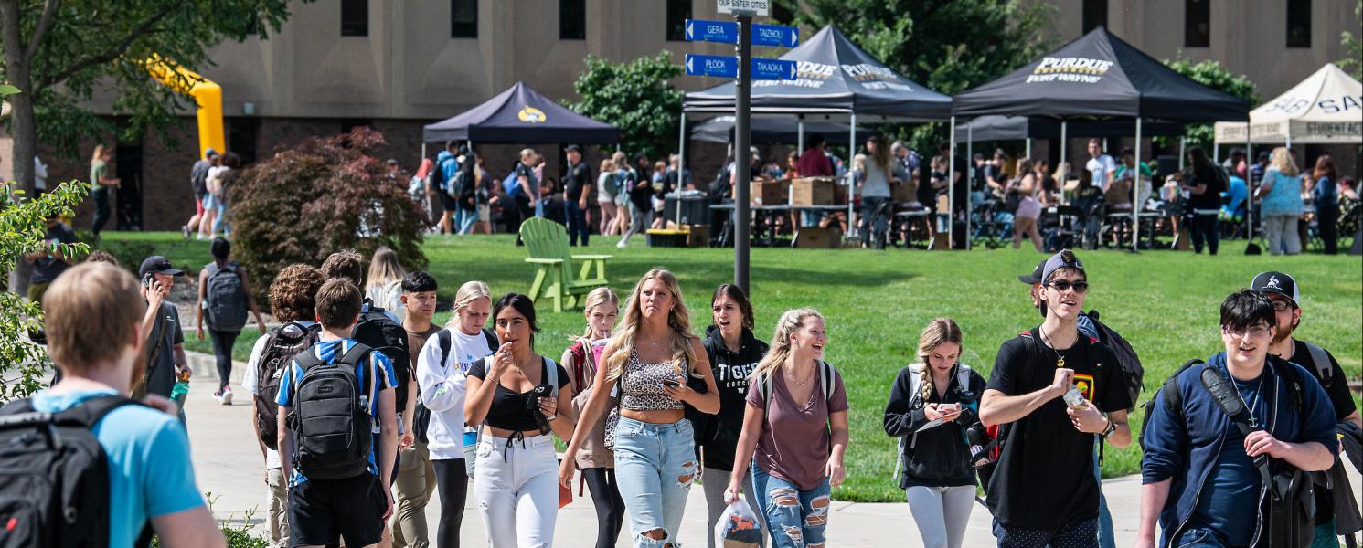 Students are walking down PFW's Mastodon Way
