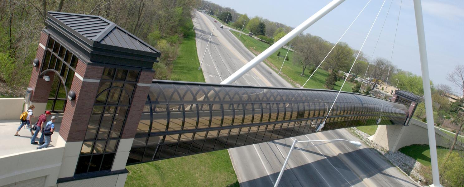 Pedestrian bridge connecting main campus to student housing.