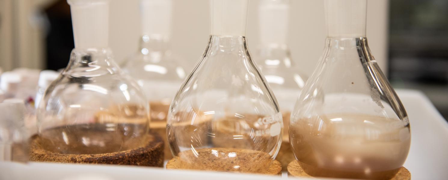 Close up photo of chemistry beakers.