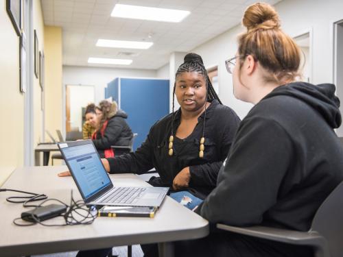 Employee advising student