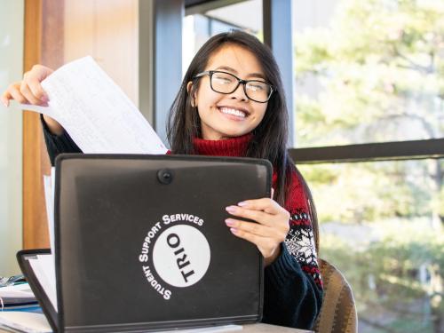 A student smiling